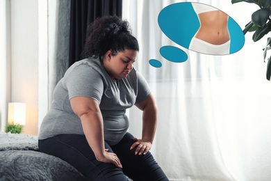 Image of Overweight woman dreaming about slim body at home. Weight loss concept