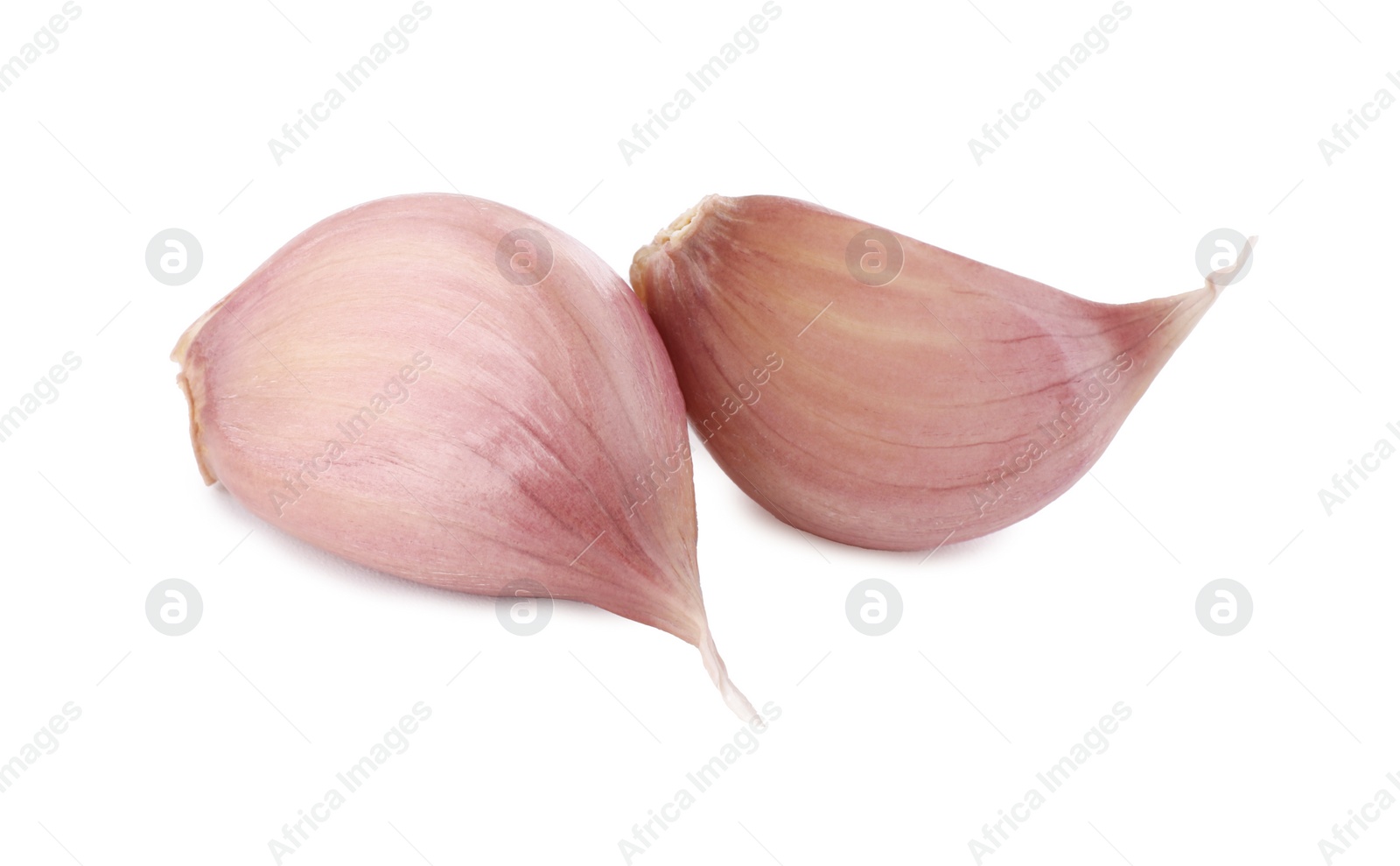 Photo of Fresh raw garlic cloves isolated on white