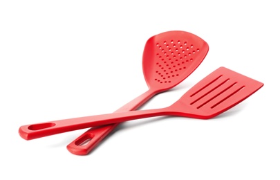 Photo of Slotted spatula and skimmer on white background