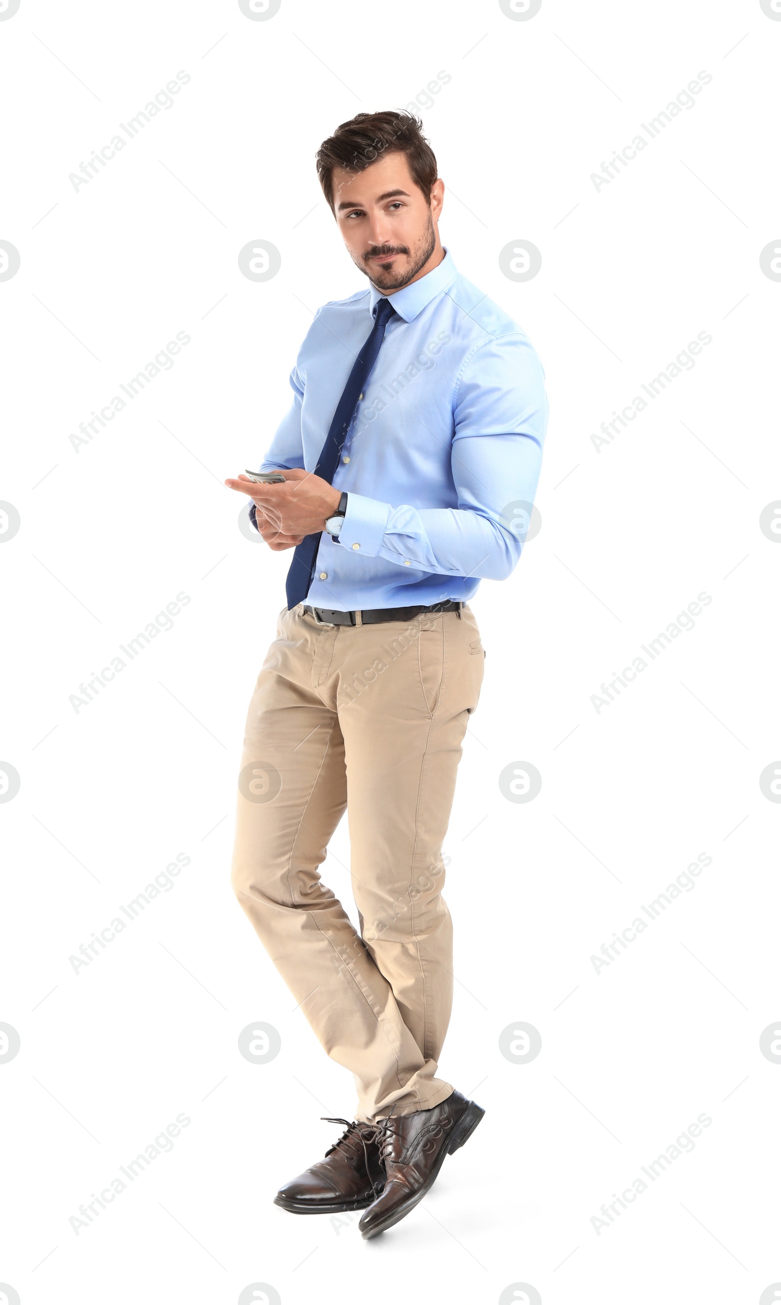 Photo of Handsome businessman counting money on white background