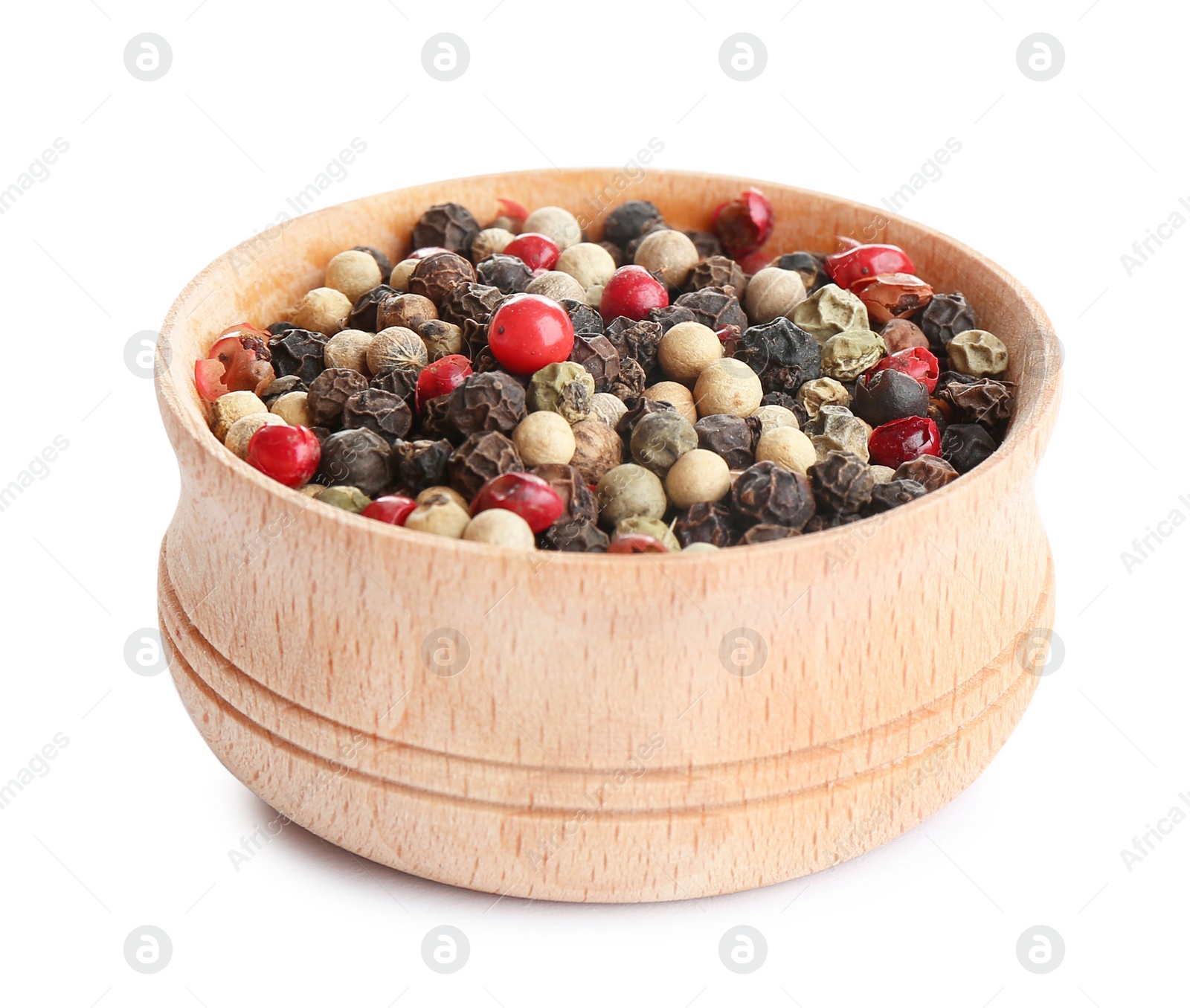 Photo of Bowl of mixed peppercorns isolated on white