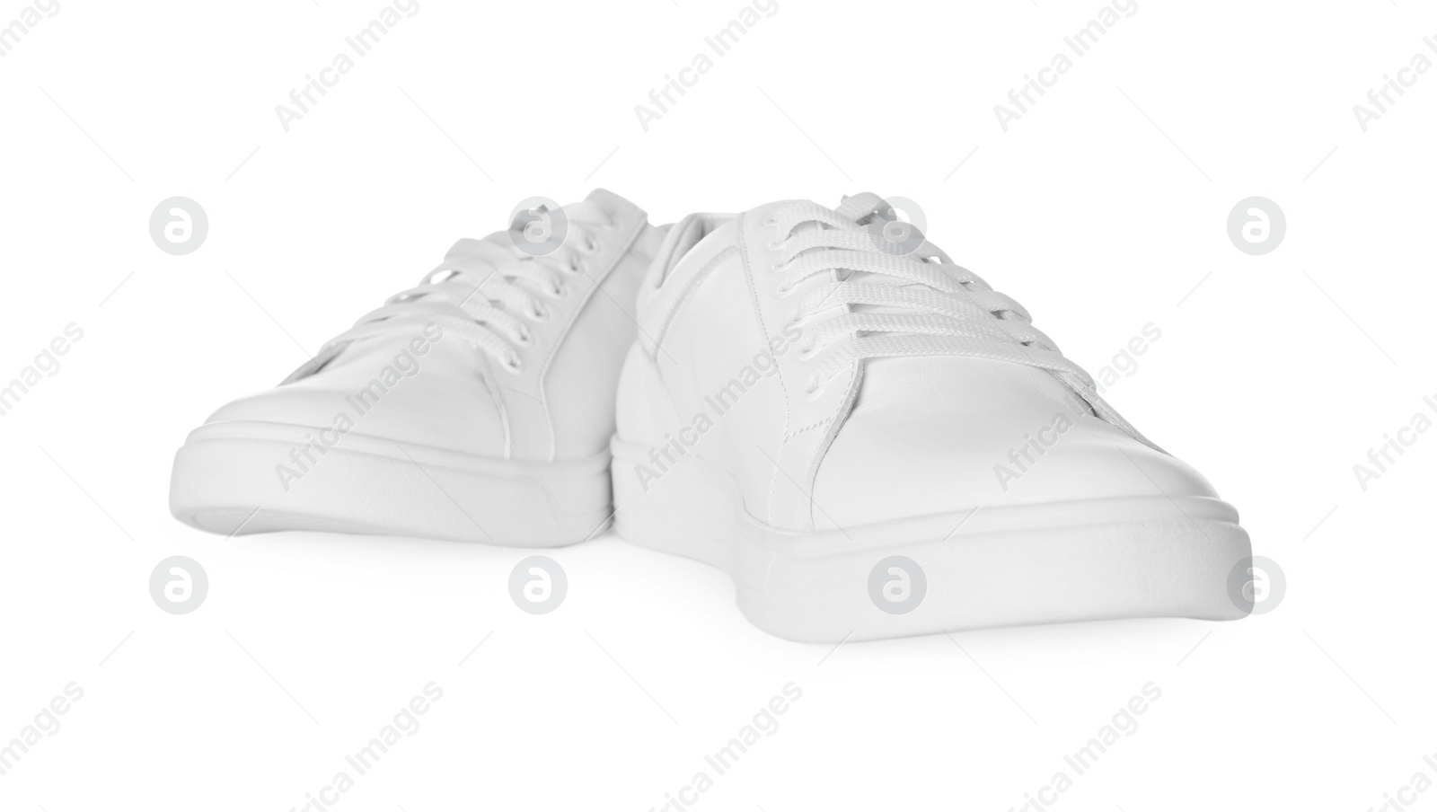 Photo of Pair of stylish sneakers isolated on white