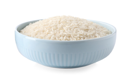 Photo of Uncooked rice in bowl isolated on white