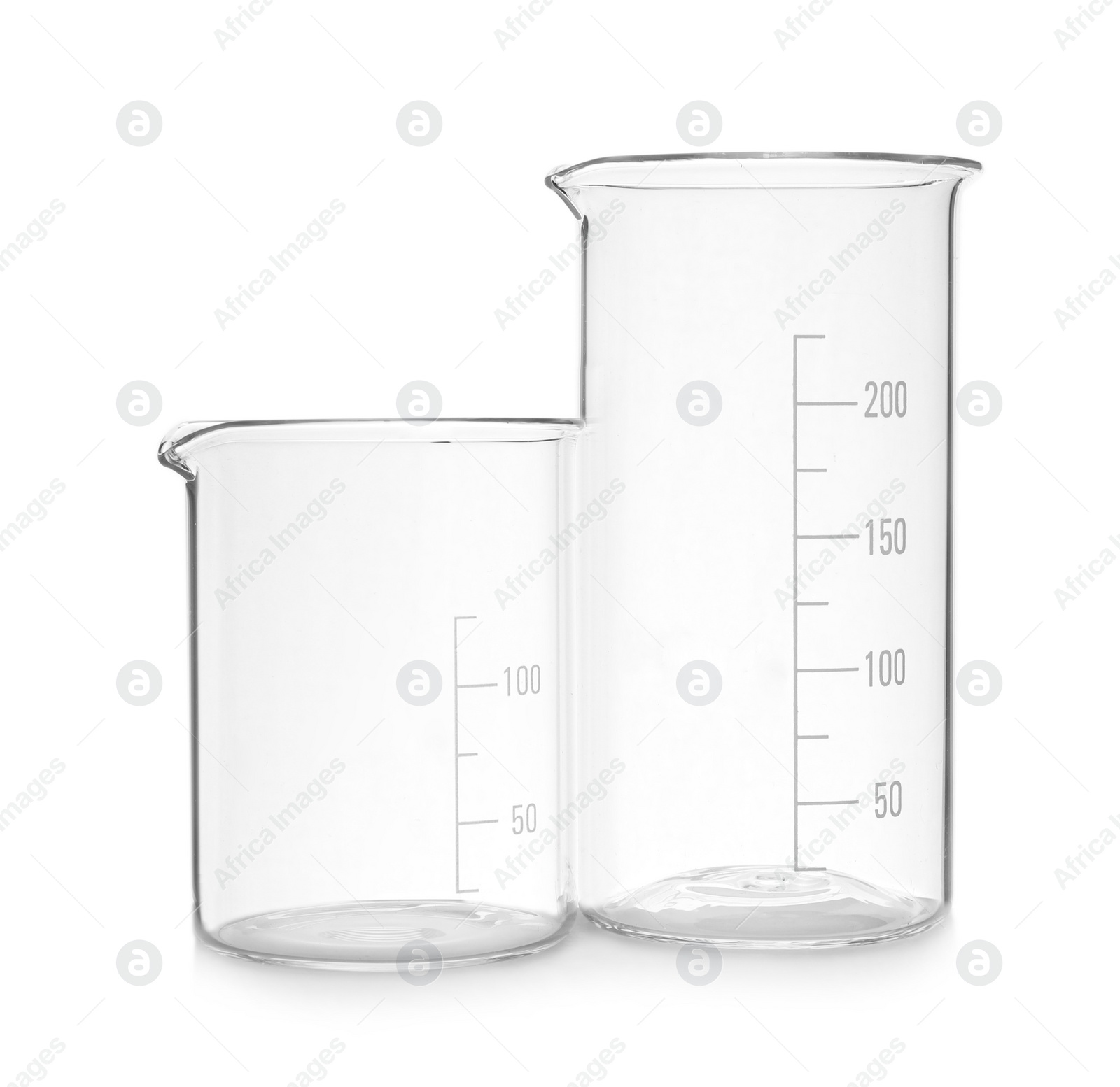 Photo of Empty beakers on white background. Laboratory glassware
