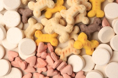 Photo of Many different vitamins for pets as background, top view