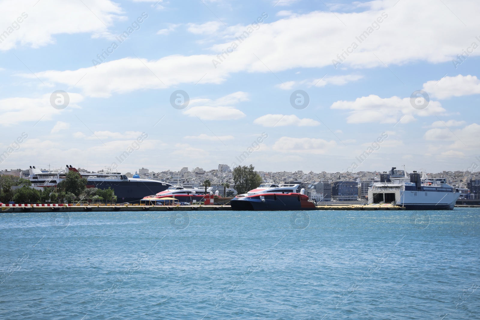 Photo of Picturesque view of port with modern boats on sunny day