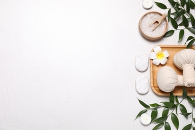 Flat lay composition with spa products on white table. Space for text