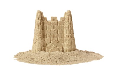 Photo of Pile of sand with beautiful castle isolated on white