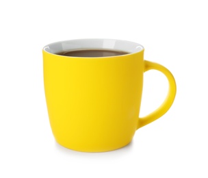 Yellow ceramic cup with hot aromatic coffee on white background