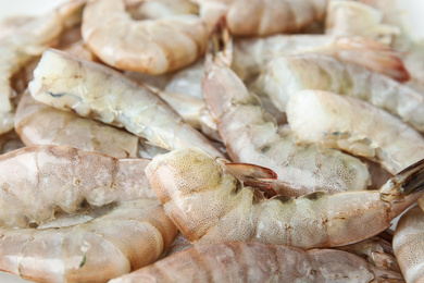 Photo of Fresh raw shrimps as background, closeup view