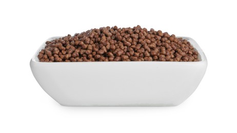 Buckwheat tea granules in bowl on white background