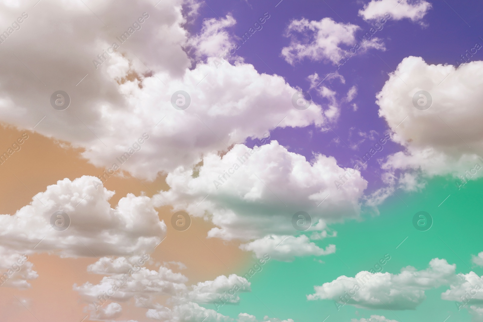 Image of Magic sky with fluffy clouds toned in bright colors