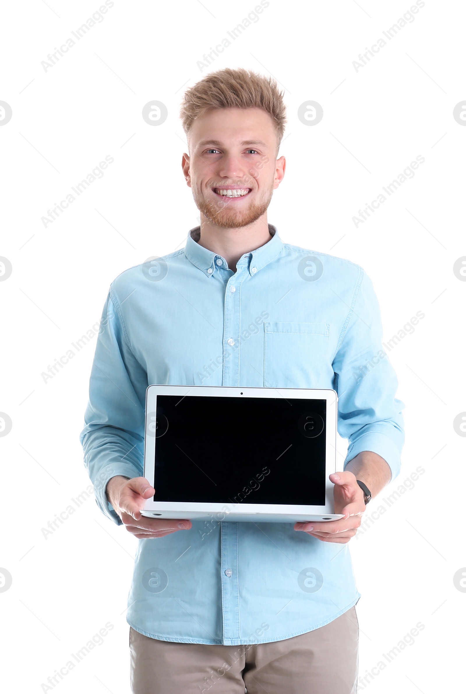 Photo of Young man with laptop on white background. Space for text