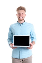 Young man with laptop on white background. Space for text