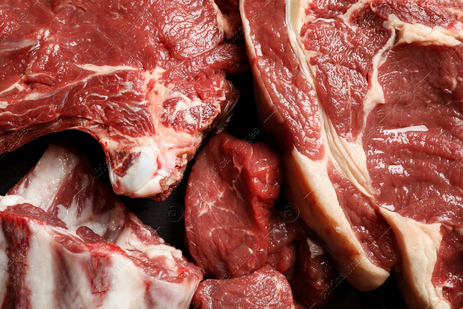 Photo of Closeup view of fresh cut raw meat