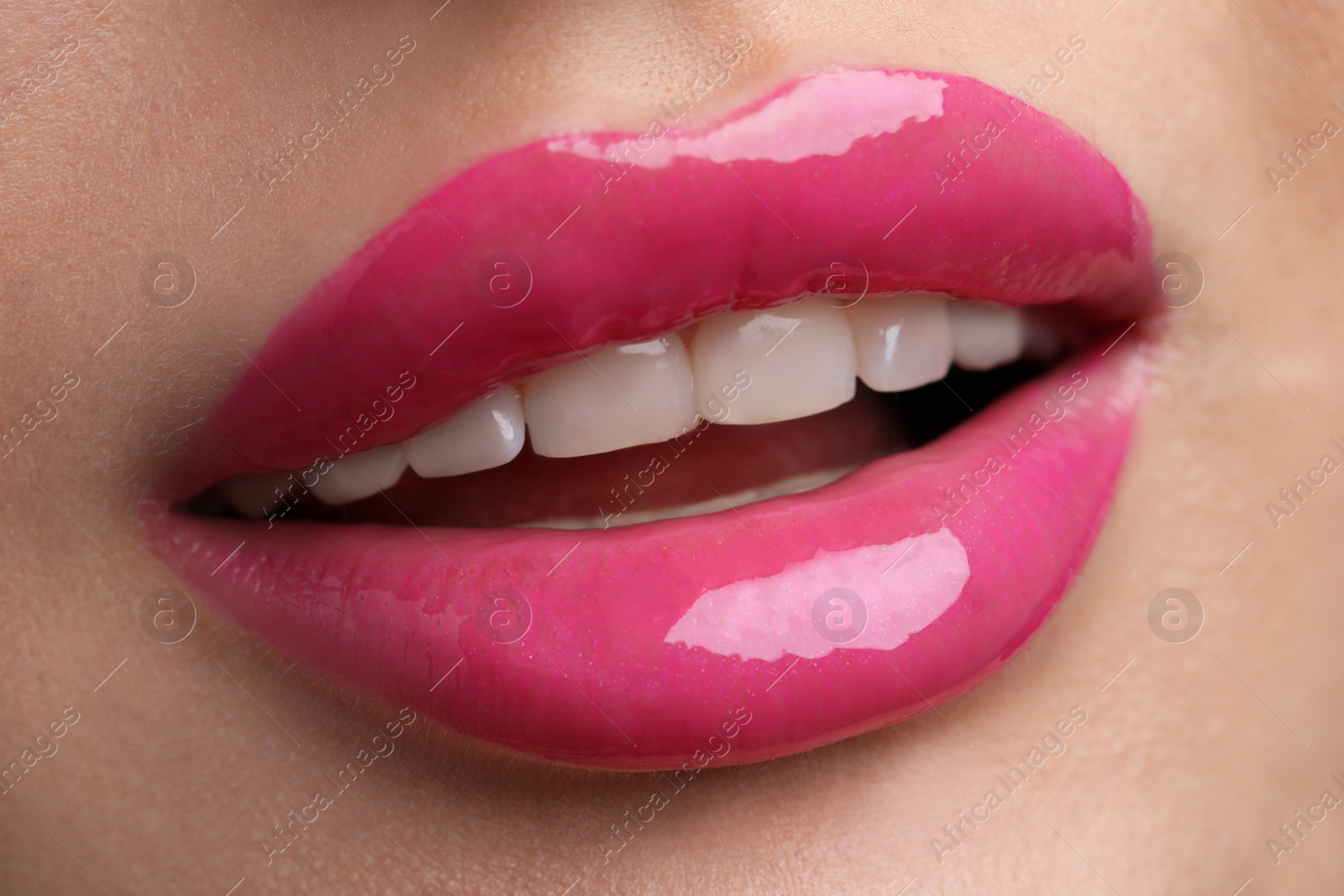 Photo of Young woman with perfect lips makeup, closeup