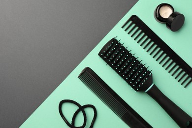 Photo of Hairbrush, combs and different hair products on color background, flat lay. Space for text
