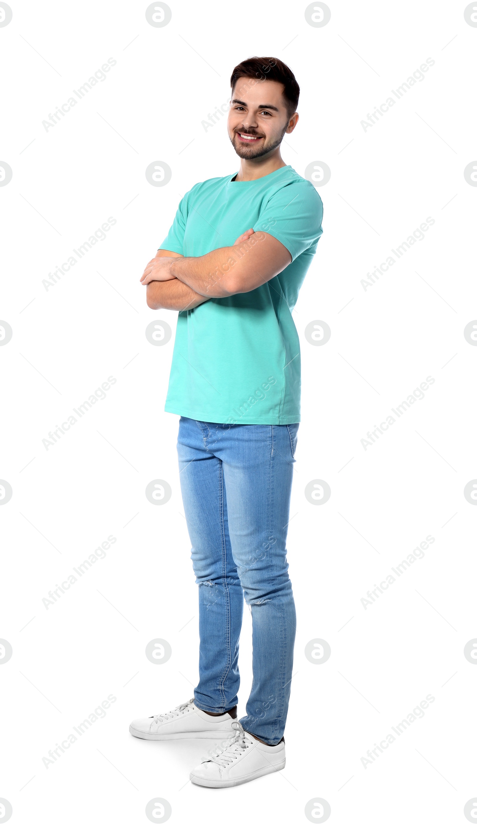 Photo of Full length portrait of handsome man posing on white background