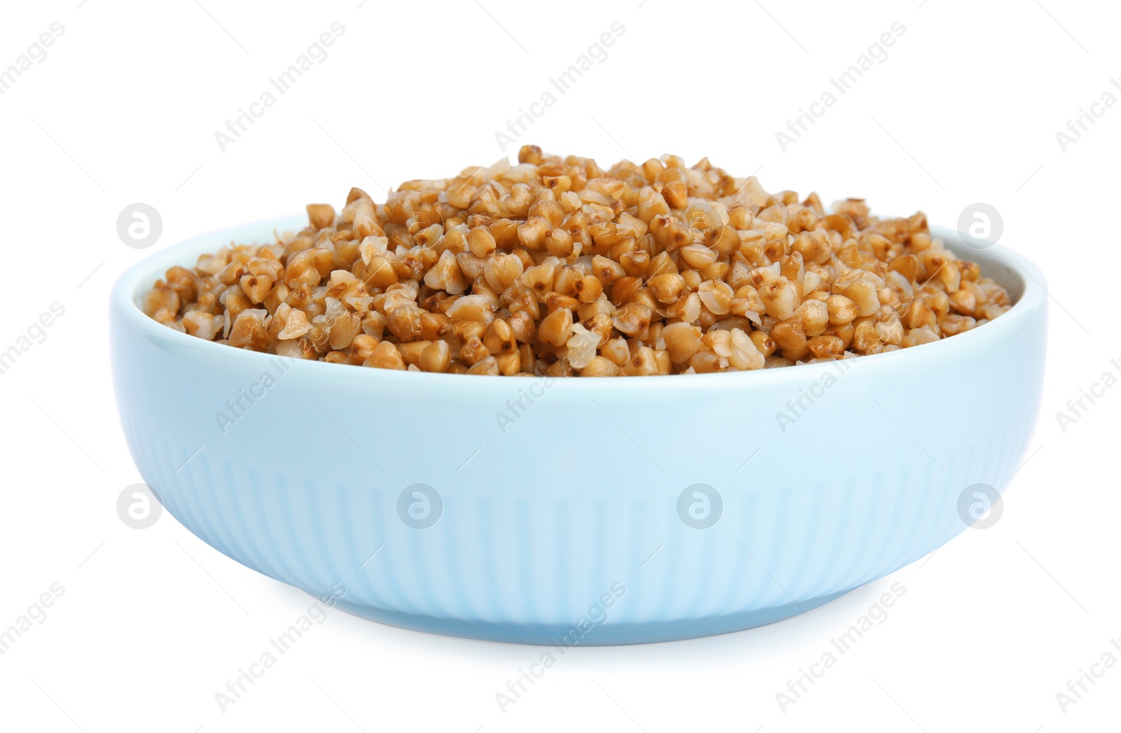 Photo of Bowl of buckwheat porridge isolated on white