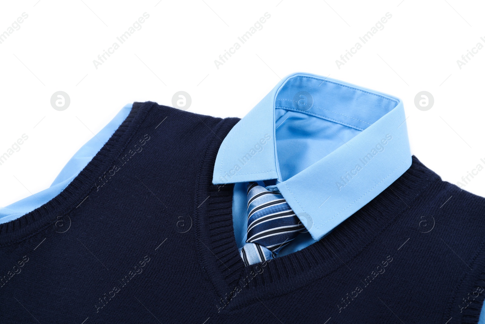 Photo of New stylish school uniform on white background, closeup