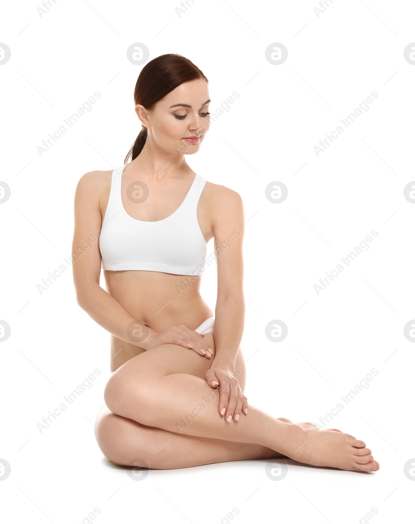 Photo of Young woman showing smooth silky skin after epilation on white background