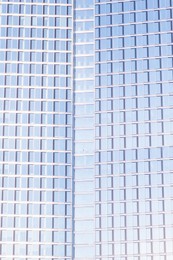 Blurred view of modern building on sunny day