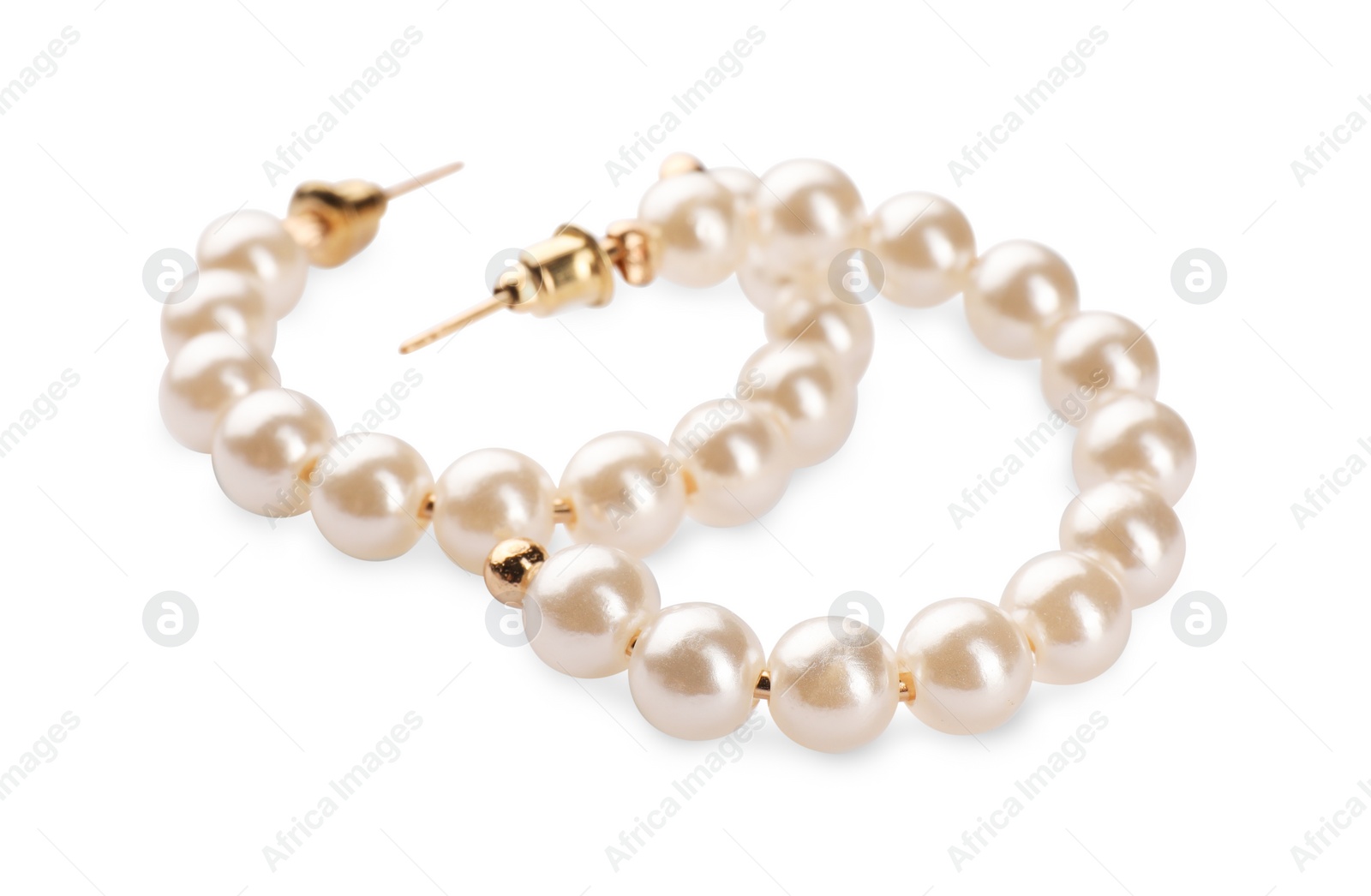 Photo of Elegant earrings with pearls isolated on white