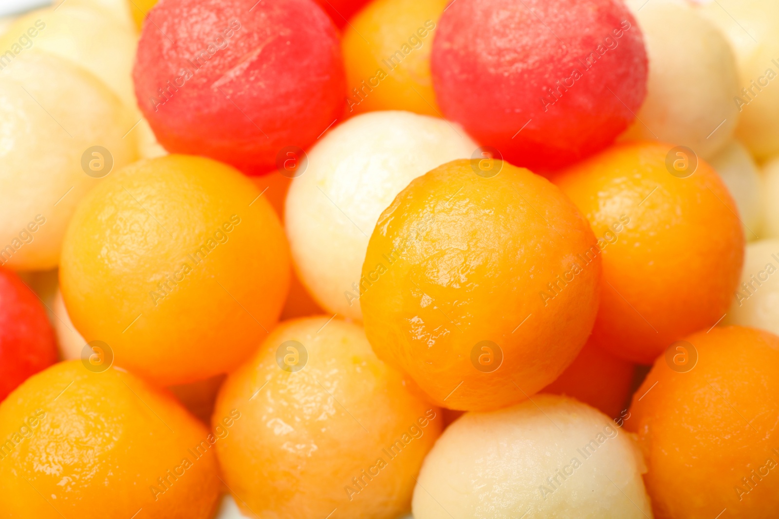 Photo of Melon and watermelon balls as background, closeup