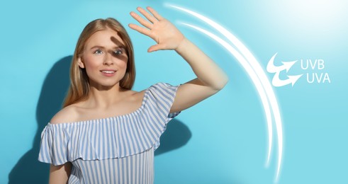 Sun protection product (sunscreen) as barrier against UVA and UVB, banner design. Beautiful young woman shading herself with hand on light blue background