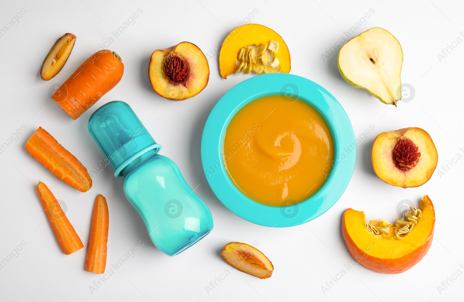 Photo of Flat lay composition with healthy baby food and ingredients on white background