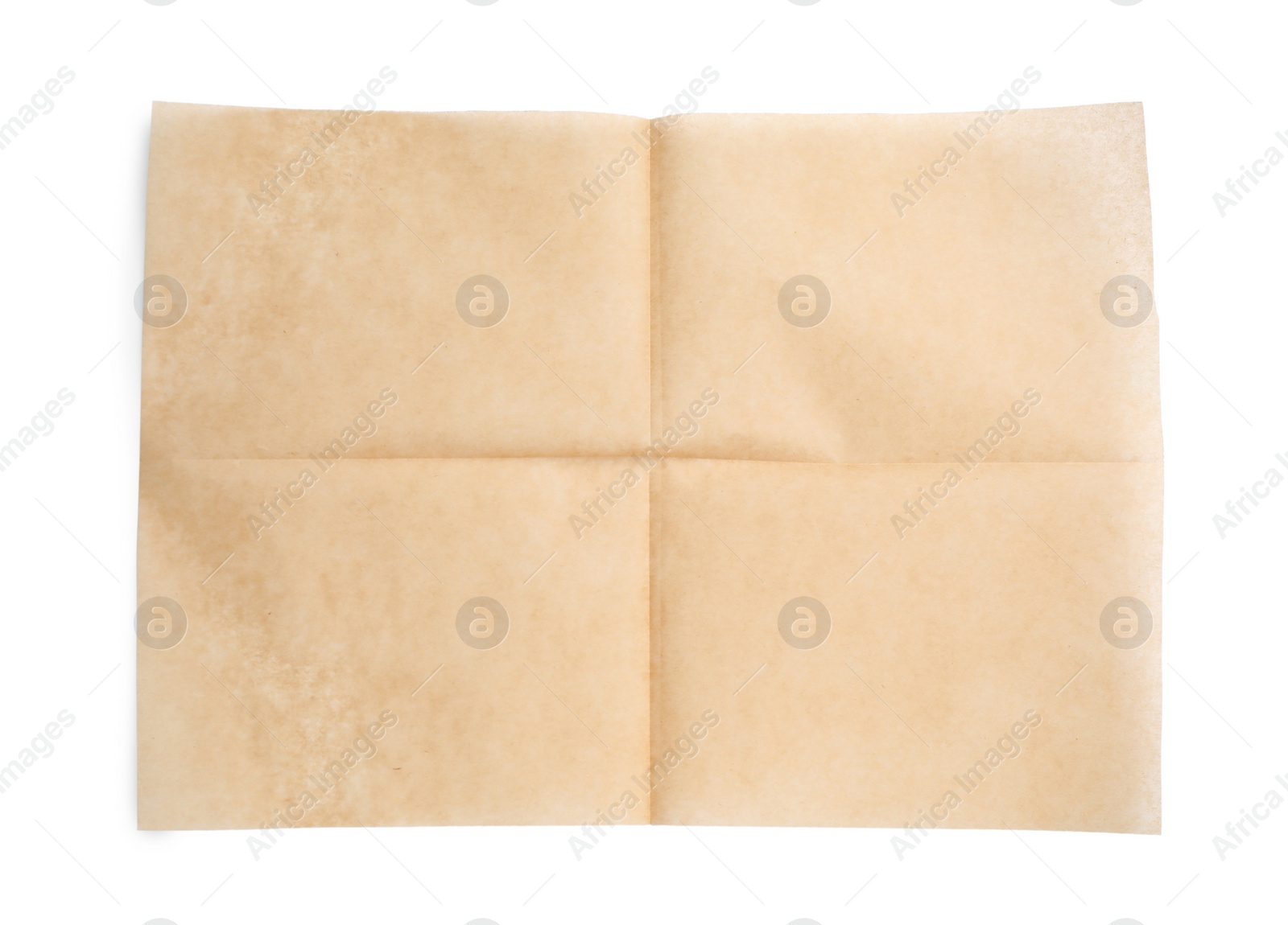 Photo of Sheet of brown baking paper on white background, top view