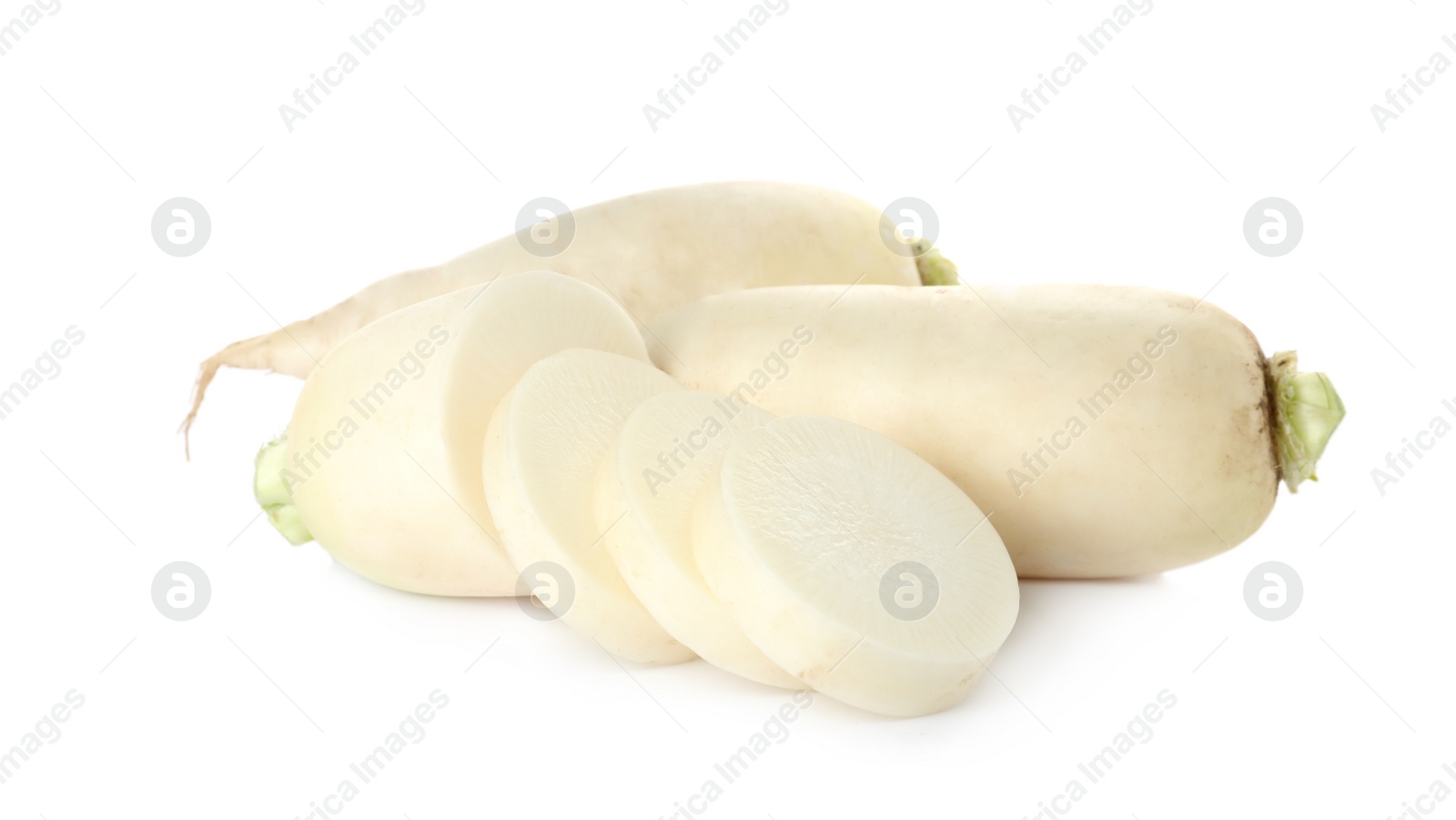 Photo of Whole and cut fresh ripe turnips on white background