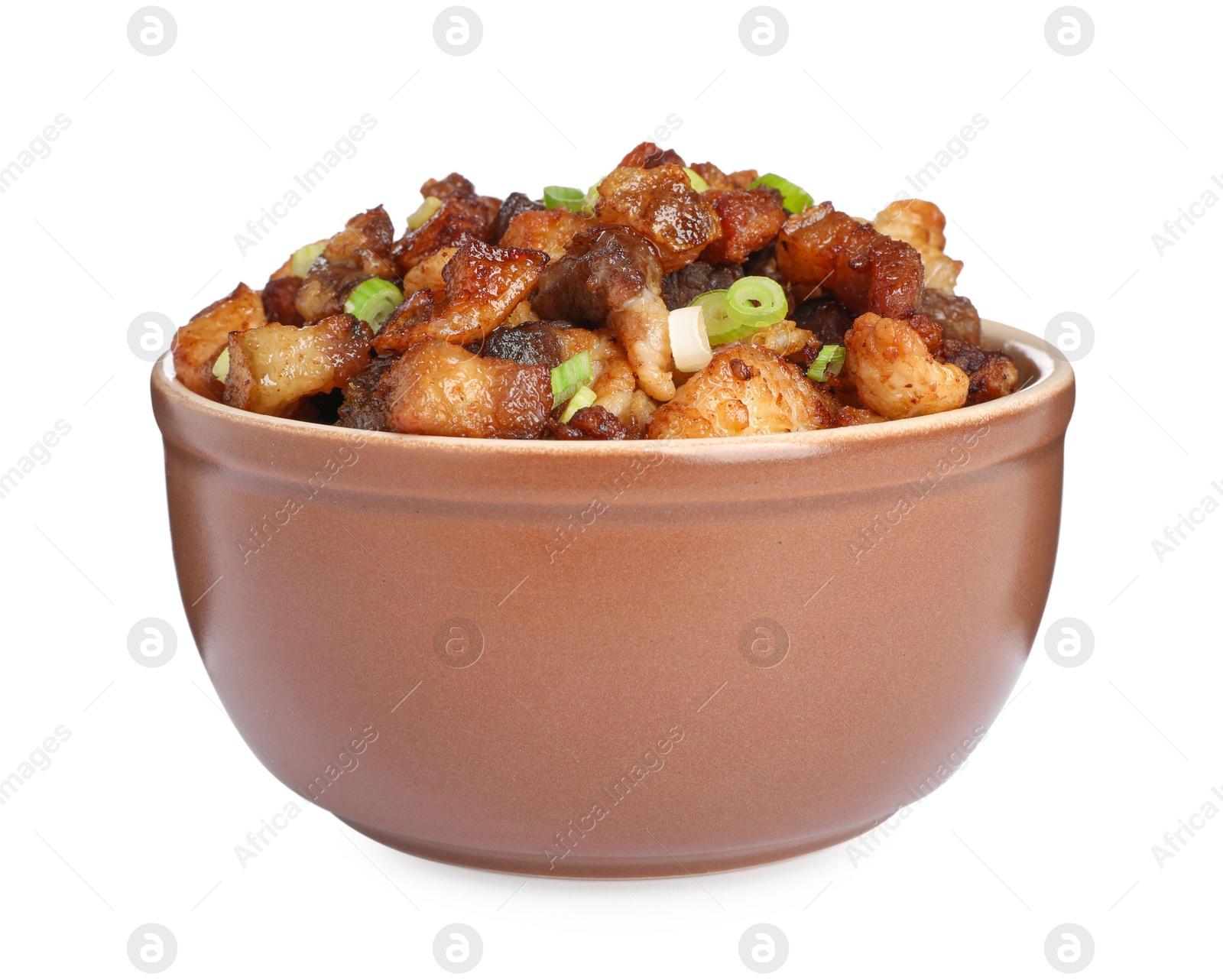 Photo of Tasty fried cracklings with green onion in bowl on white background. Cooked pork lard