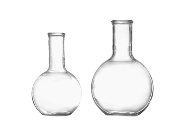 Photo of Empty Florence flasks on white background. Chemistry glassware