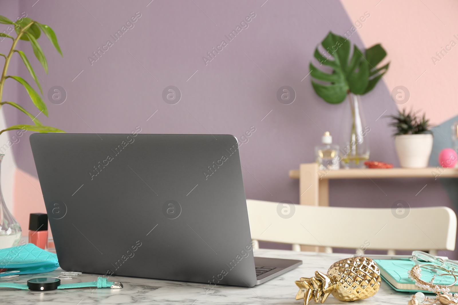 Photo of Modern workplace with laptop on table indoors, space for text. Professional blogger