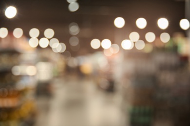 Blurred view of modern shopping mall interior