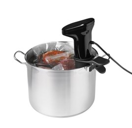 Photo of Thermal immersion circulator and meat in pot on white background. Vacuum packing for sous vide cooking