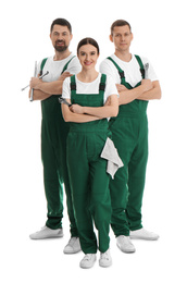 Photo of Full length portrait of professional auto mechanics on white background