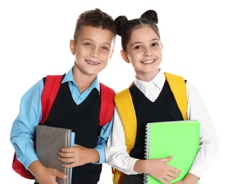 Photo of Happy children in school uniform on white background