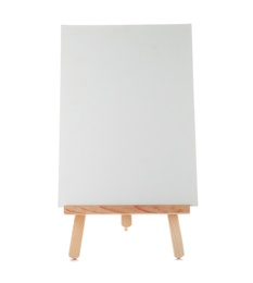 Photo of Wooden easel with blank canvas board on white background. Children's painting