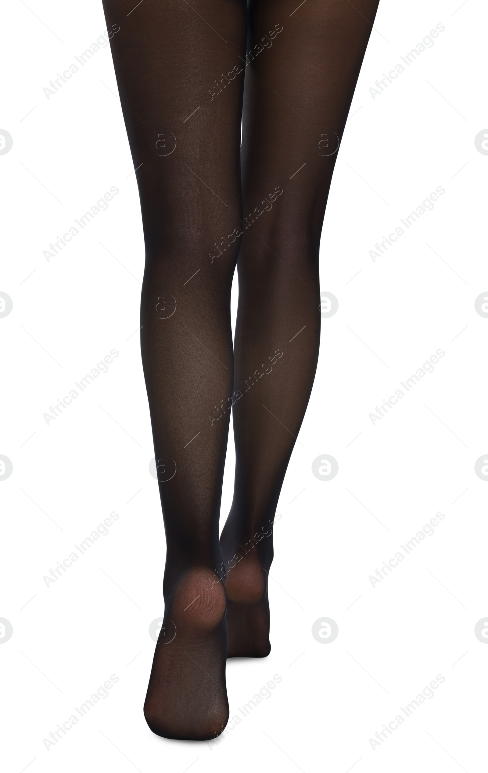 Photo of Woman with beautiful long legs wearing black tights on white background, closeup