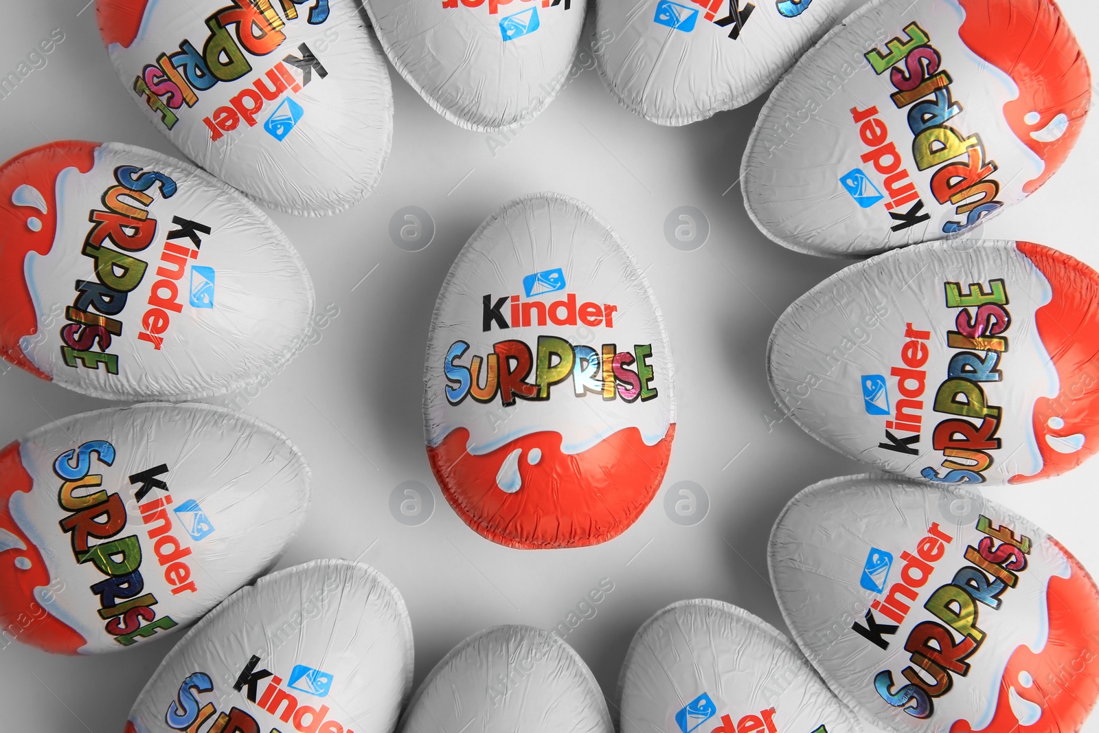 Photo of Sveti Vlas, Bulgaria - June 26, 2023: Kinder Surprise Eggs on white background, flat lay