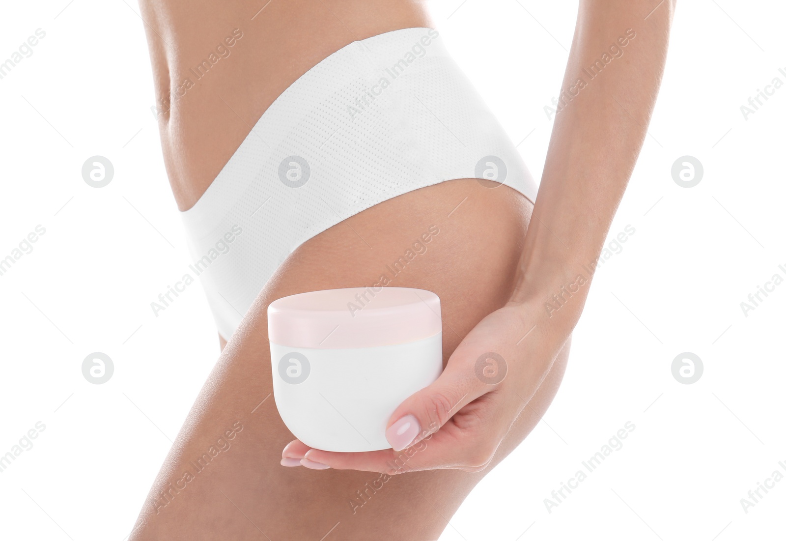 Photo of Young woman with jar of cream on white background, closeup. Beauty and body care