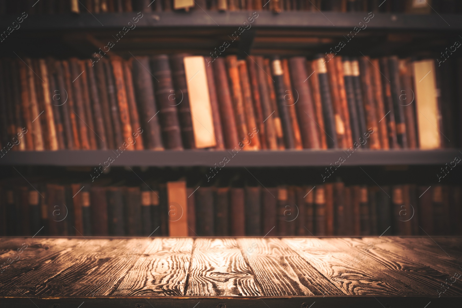 Image of Empty wooden table in library. Space for design 