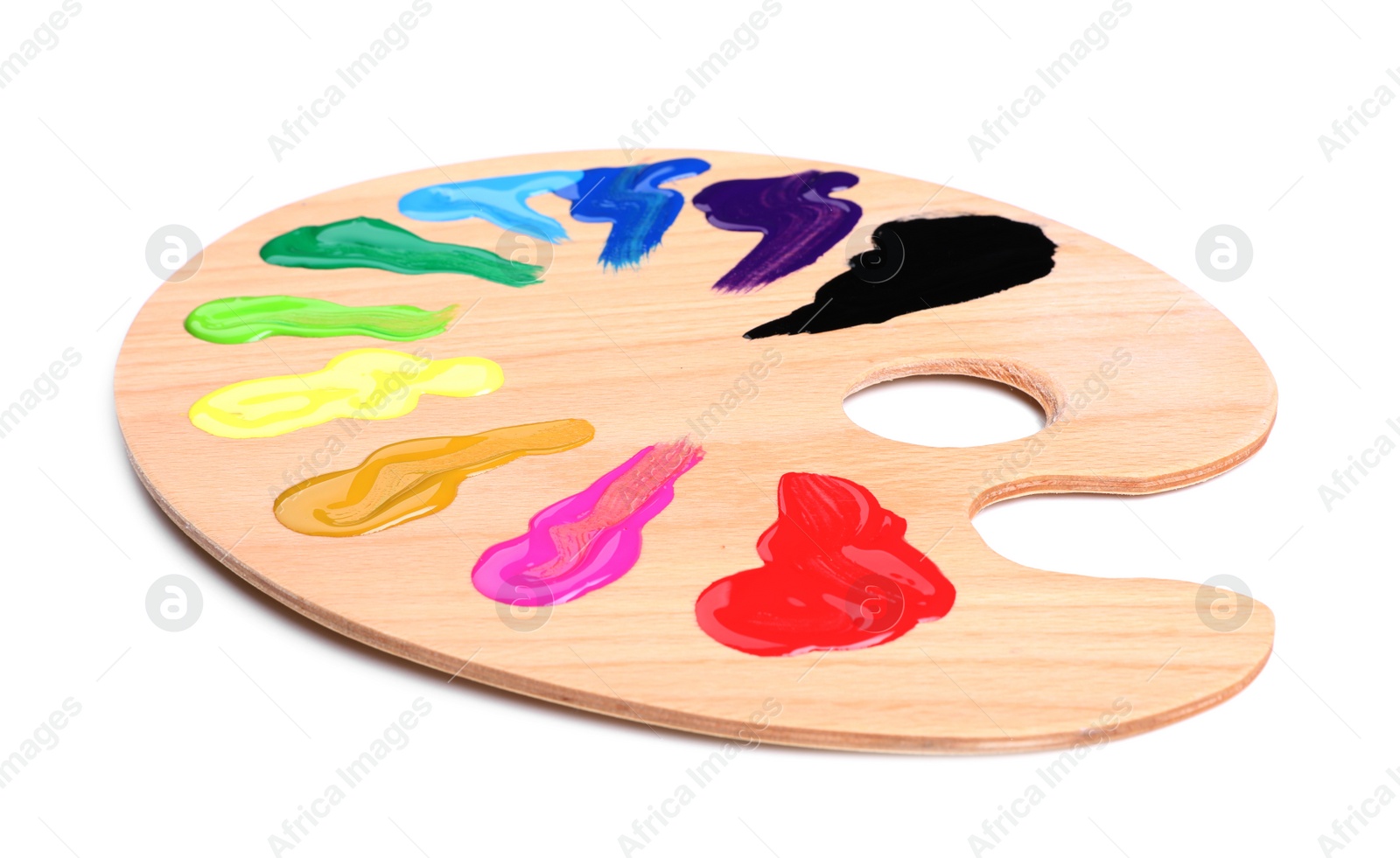 Photo of Palette with paints on white background. Artist equipment