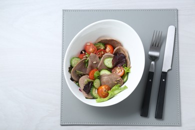 Photo of Delicious salad with beef tongue and vegetables served on white wooden table, flat lay. Space for text