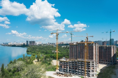 Image of Aerial view of buildings construction in city center