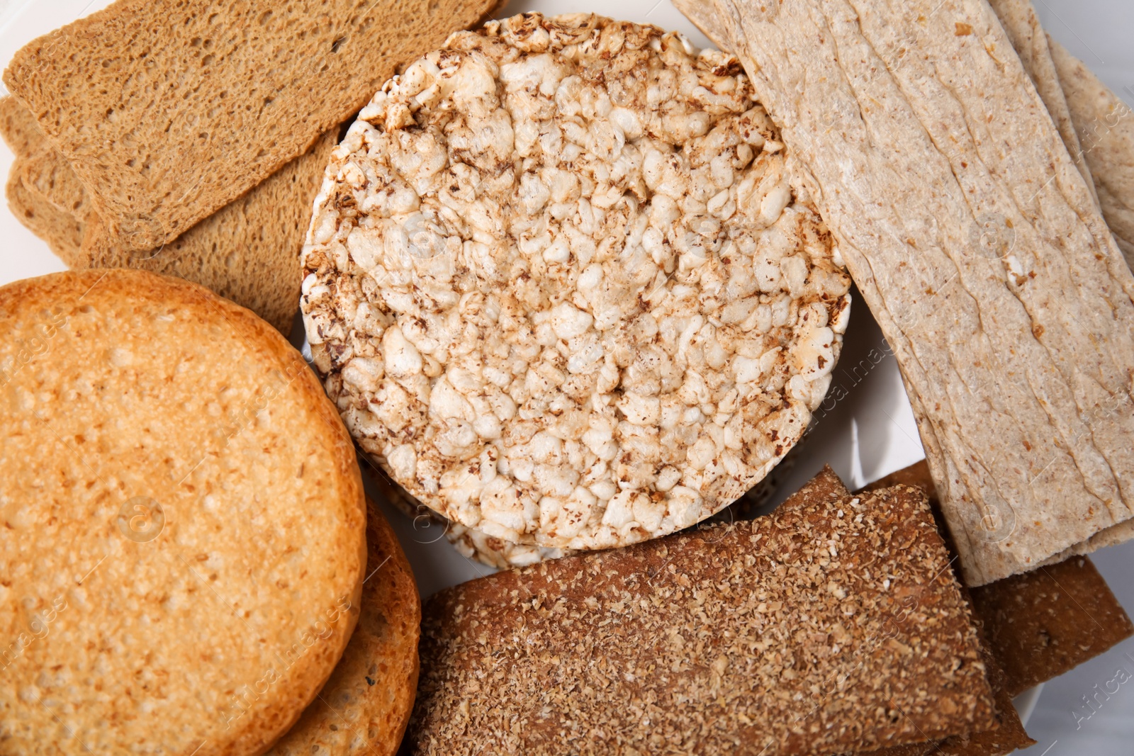 Photo of Rye crispbreads, rice cakes and rusks, closeup