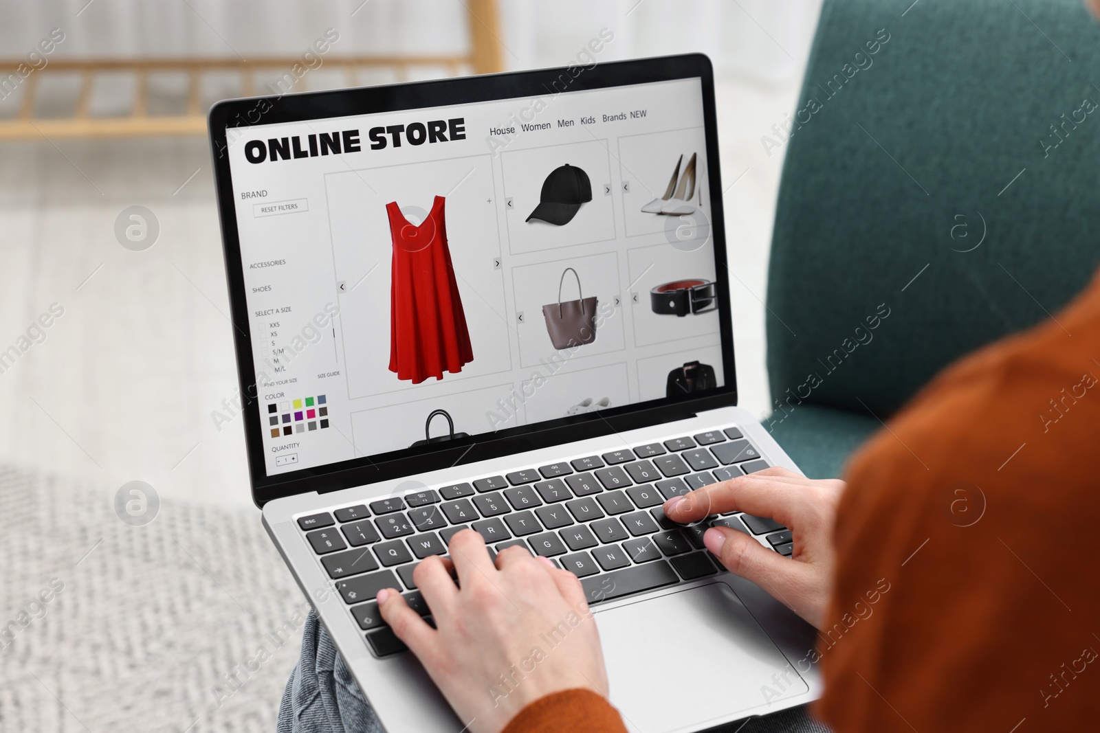 Photo of Woman with laptop shopping online at home, closeup