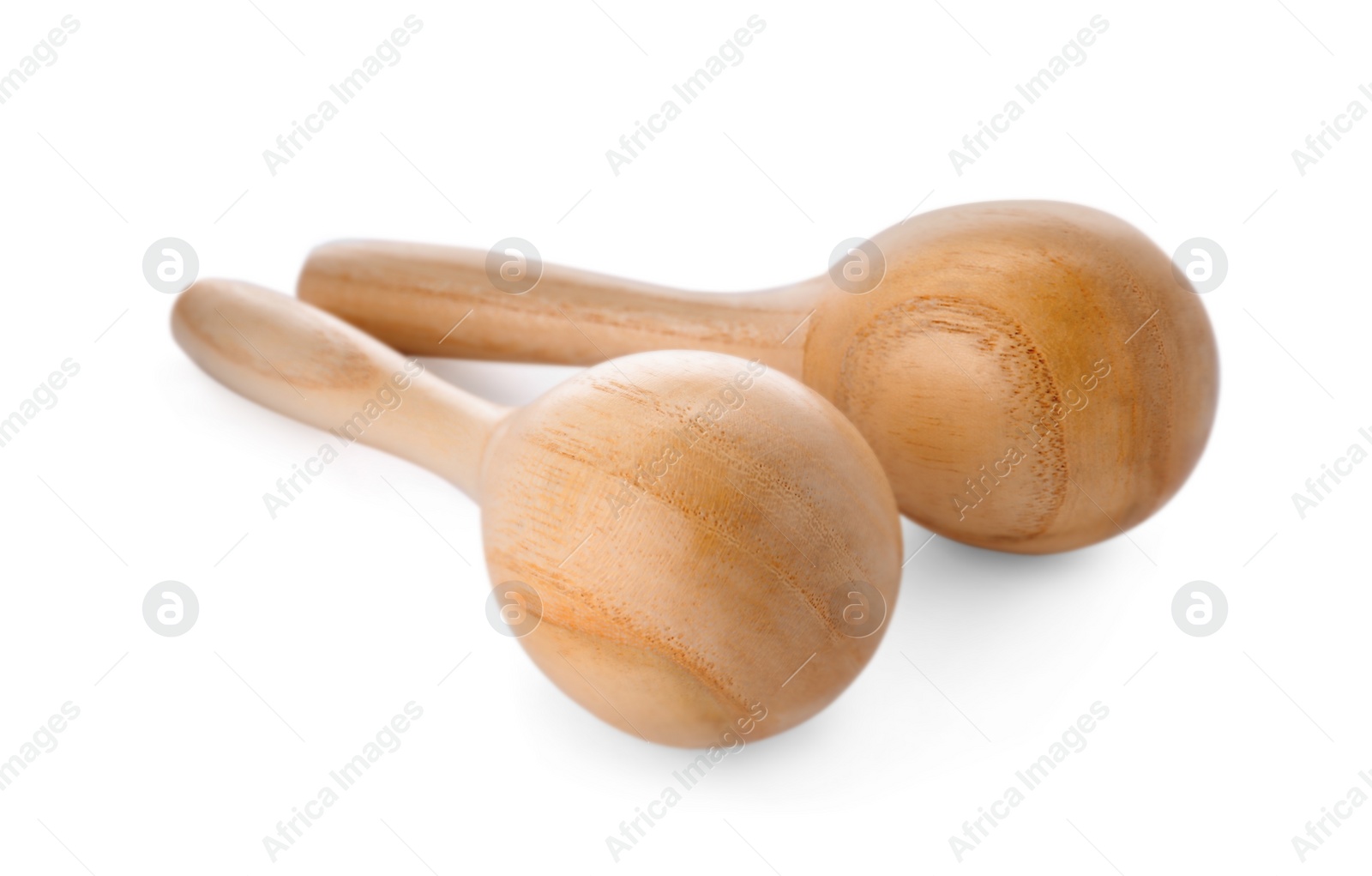 Photo of Wooden maracas isolated on white. Musical instrument